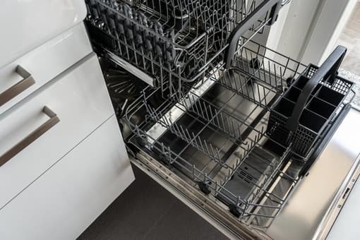 Birdseye view of an empty stainless steal dishwasher