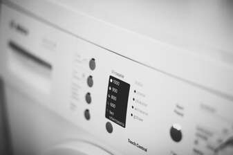 Photo of a laundry machine control panel